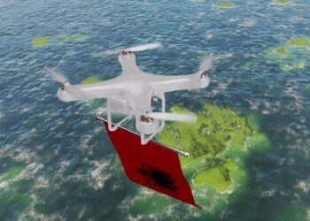 VideoHive The Drone Flying With Albania Flag Above The Sea 47547823