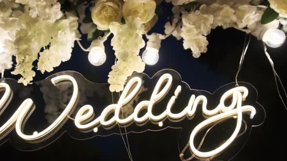VideoHive The Wedding Arch with Neon Inscription of Wedding Day at the Ceremony 47687776